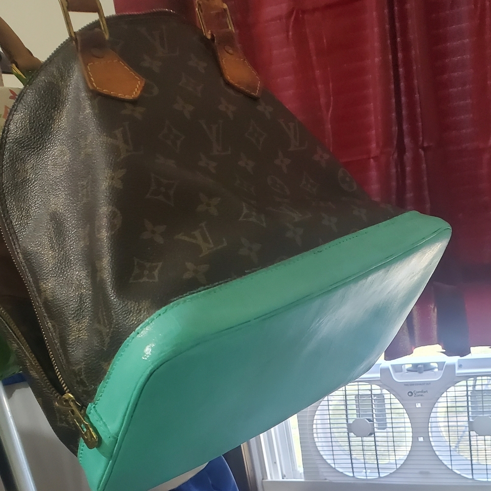 Repairs in progress. Louis vuitton monogram alma mm